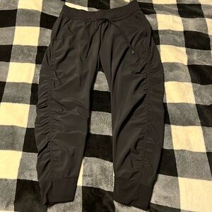 Athleta Black Joggers with gathered type detail down the sides. Size 6P